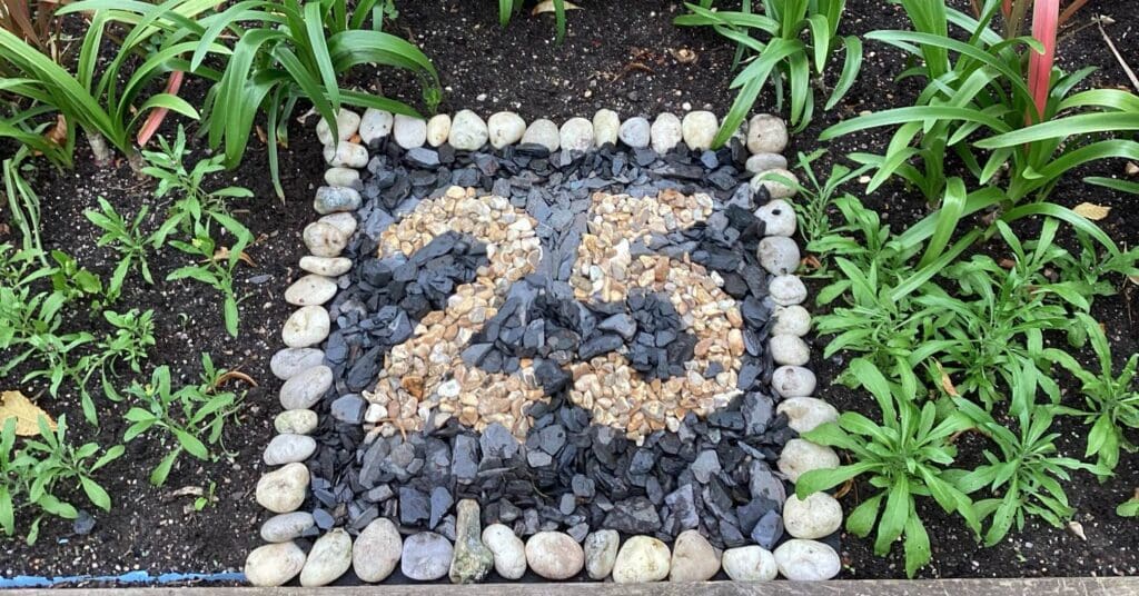 25 years designed in pebbles