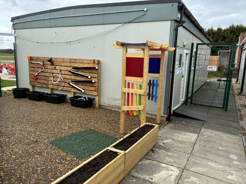 6th form outside learning space sensory arch